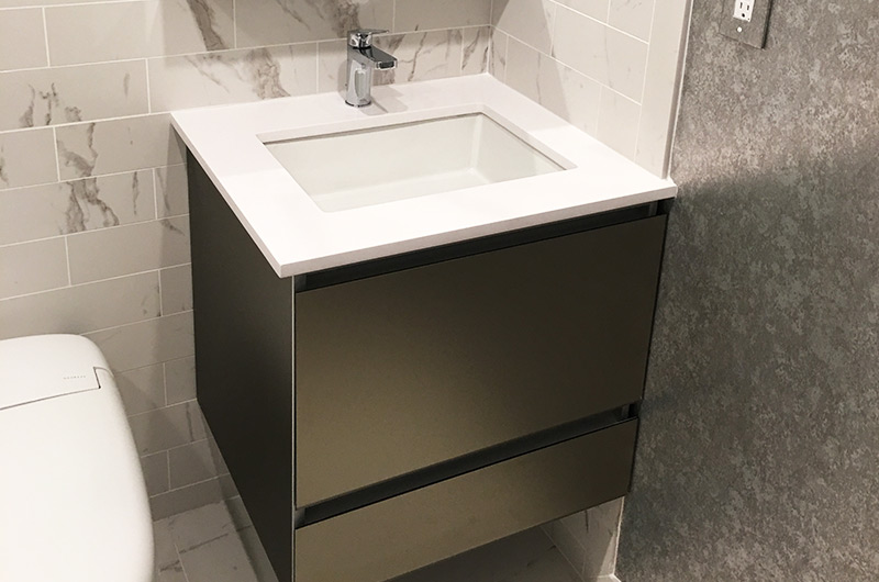 Compact bathroom gray wall tiles beige mosaic