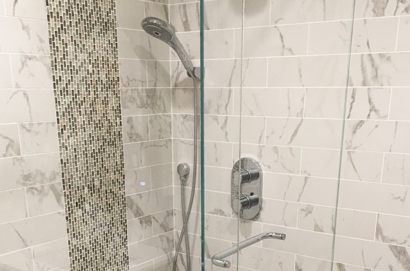 Custom shower base frameless glass enclosure