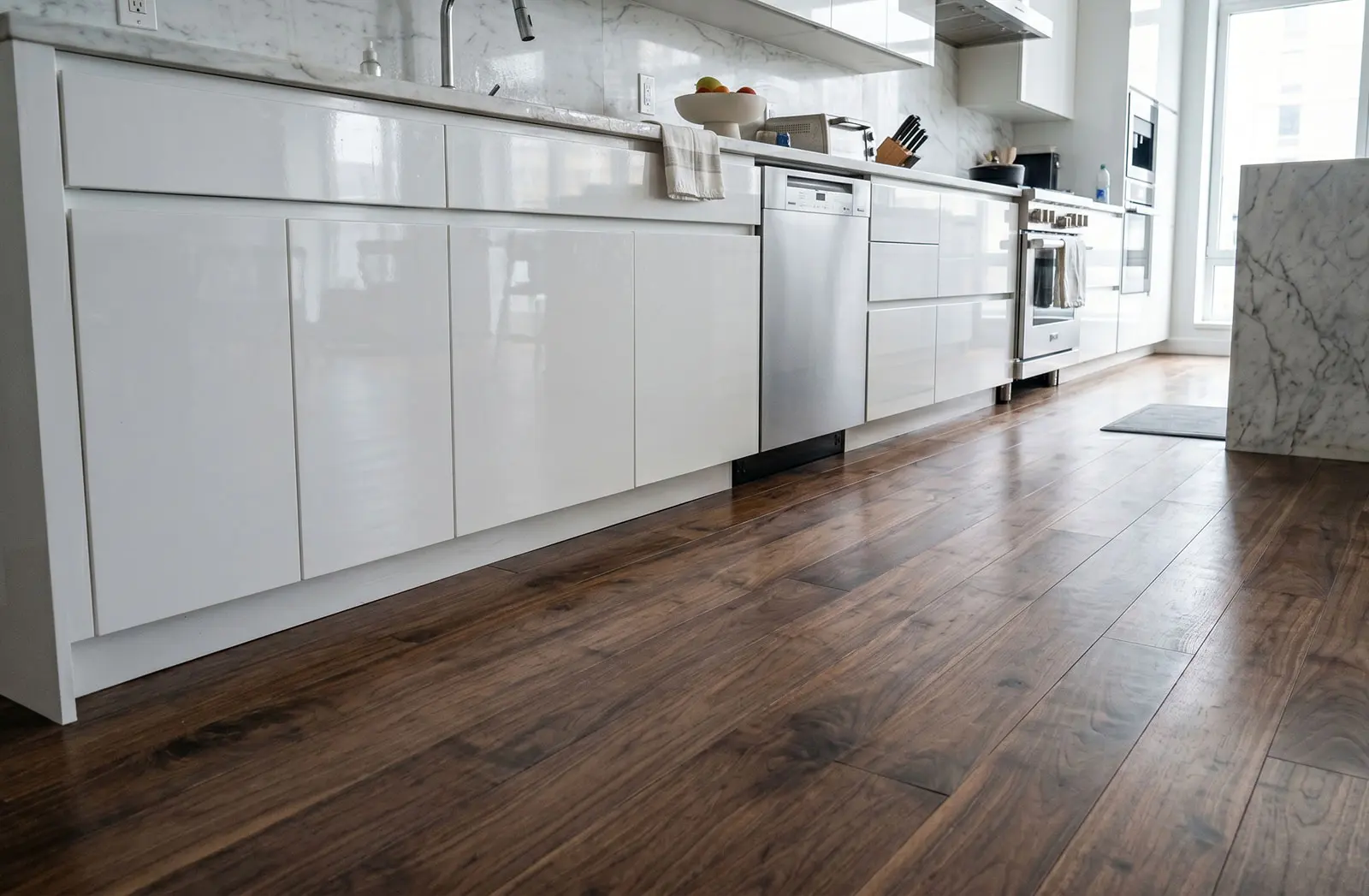 Kitchen floor and cabinetry reconstruction completed by water damage restoration NYC.