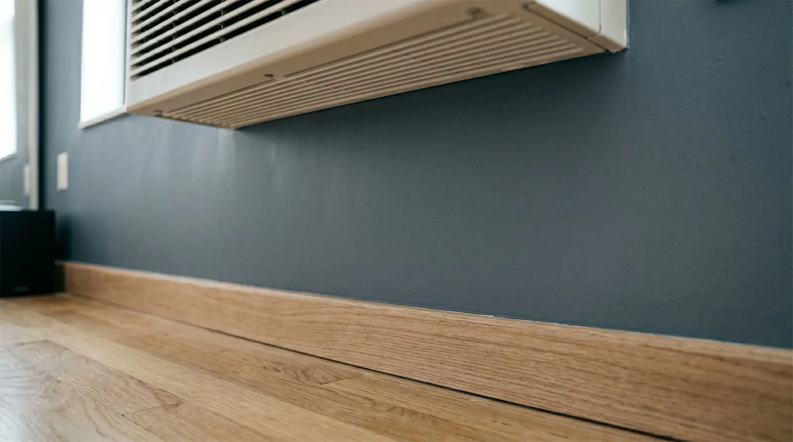 Post-leak wall reconstruction and high-end painting services in New York City.